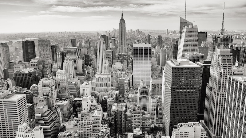 An aerial black and white photo of downtown Manhattan